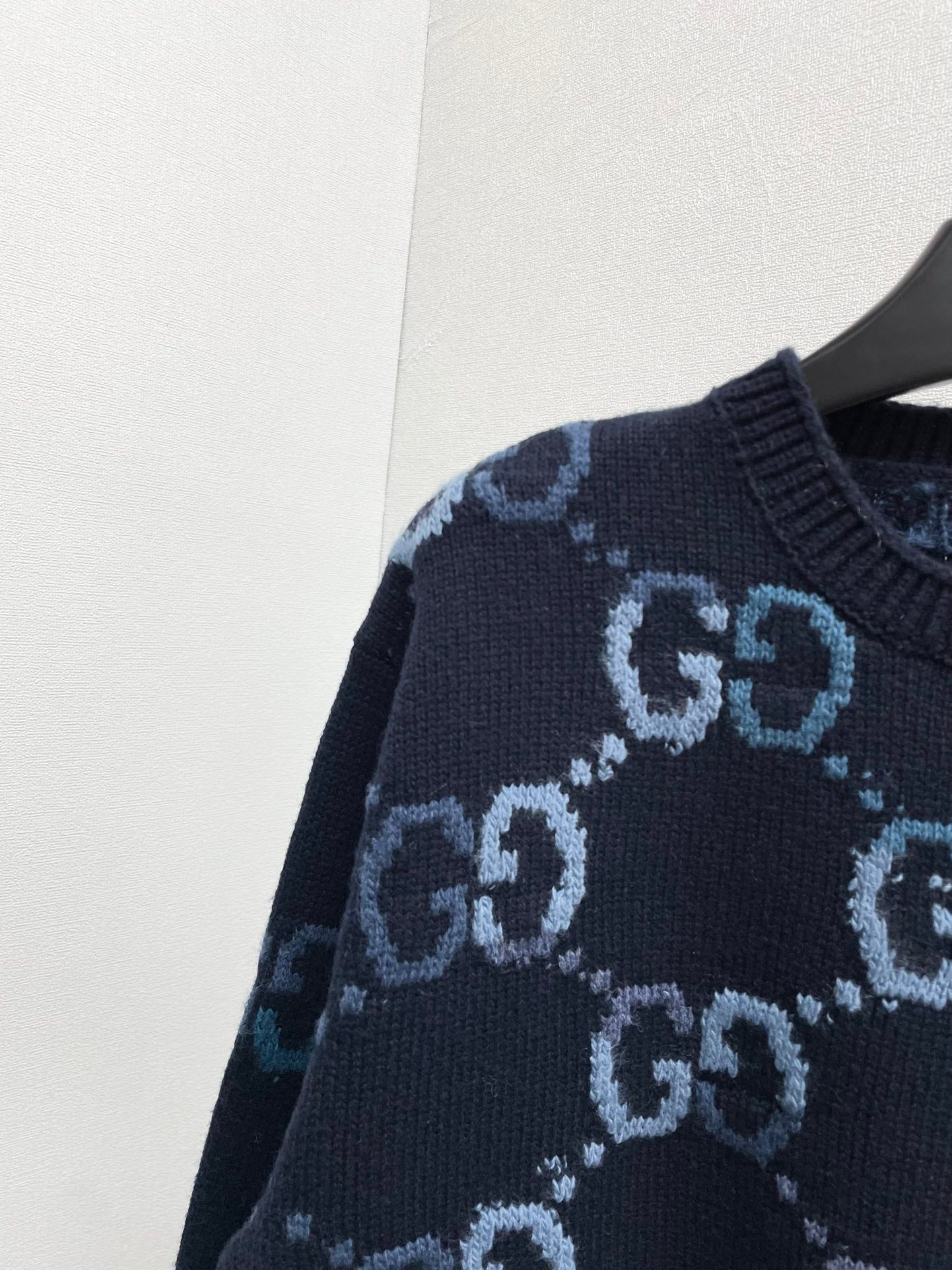 blue embroidered sweater