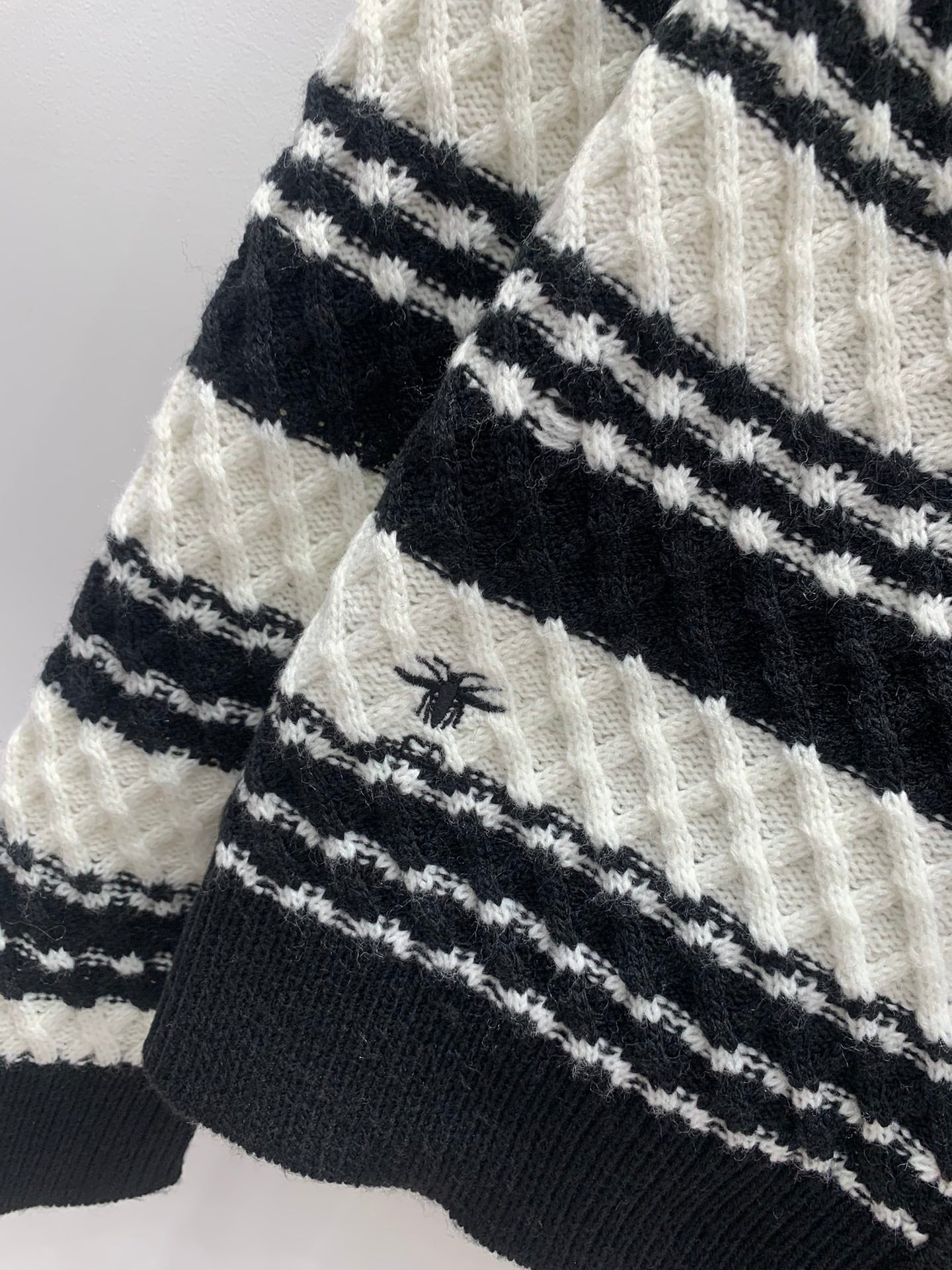 Black and white striped knitted cardigan