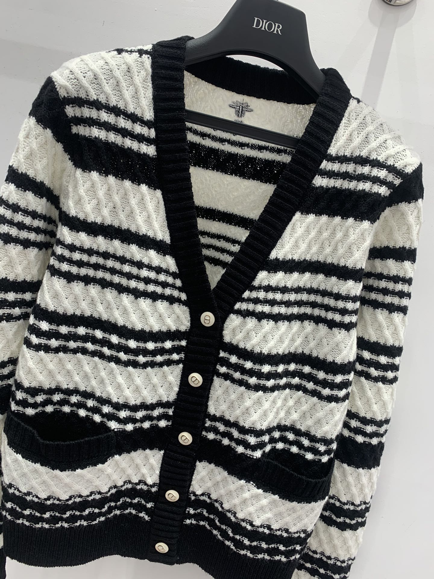 Black and white striped knitted V-neck cardigan