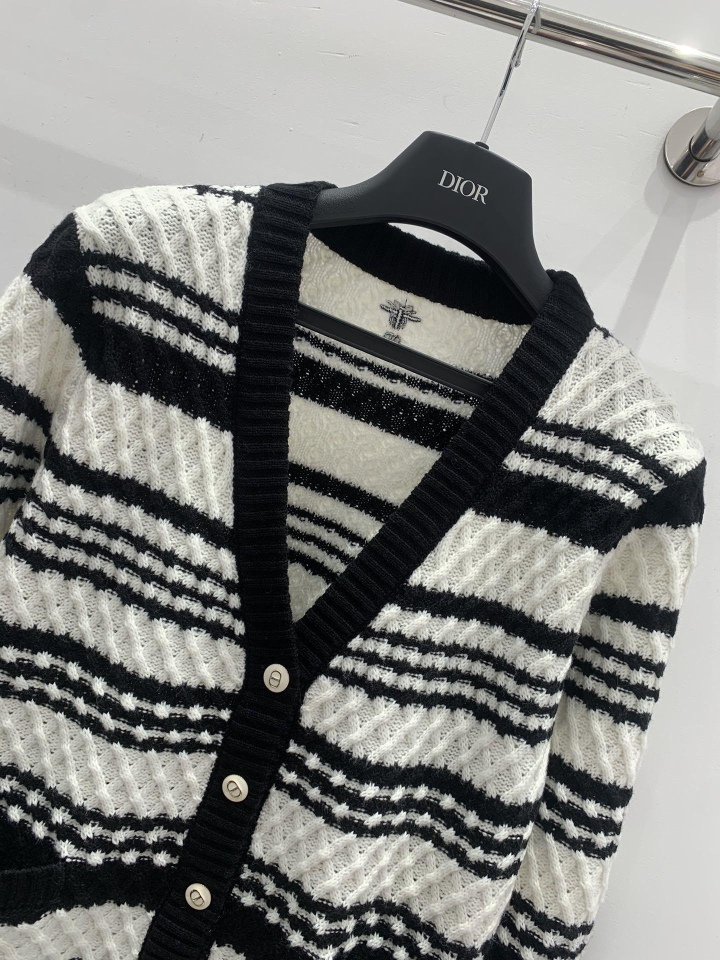 Black and white striped knitted V-neck cardigan