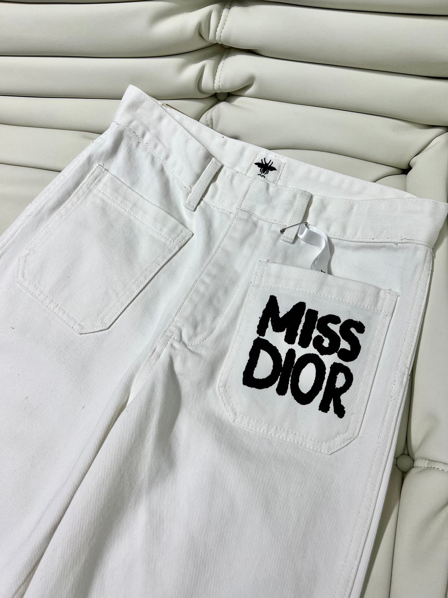 Double pocket logo print jeans