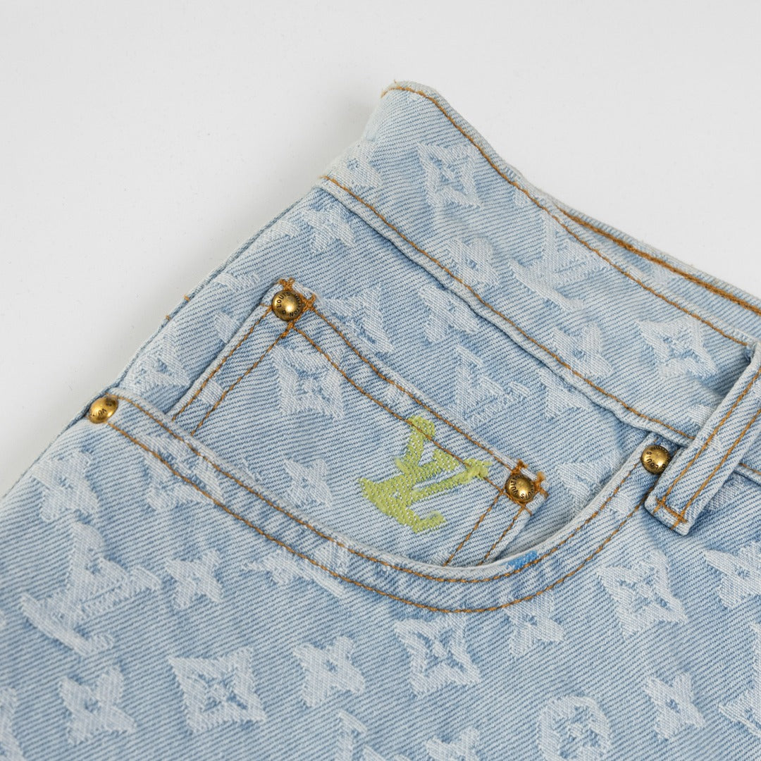 Joint embroidered jeans