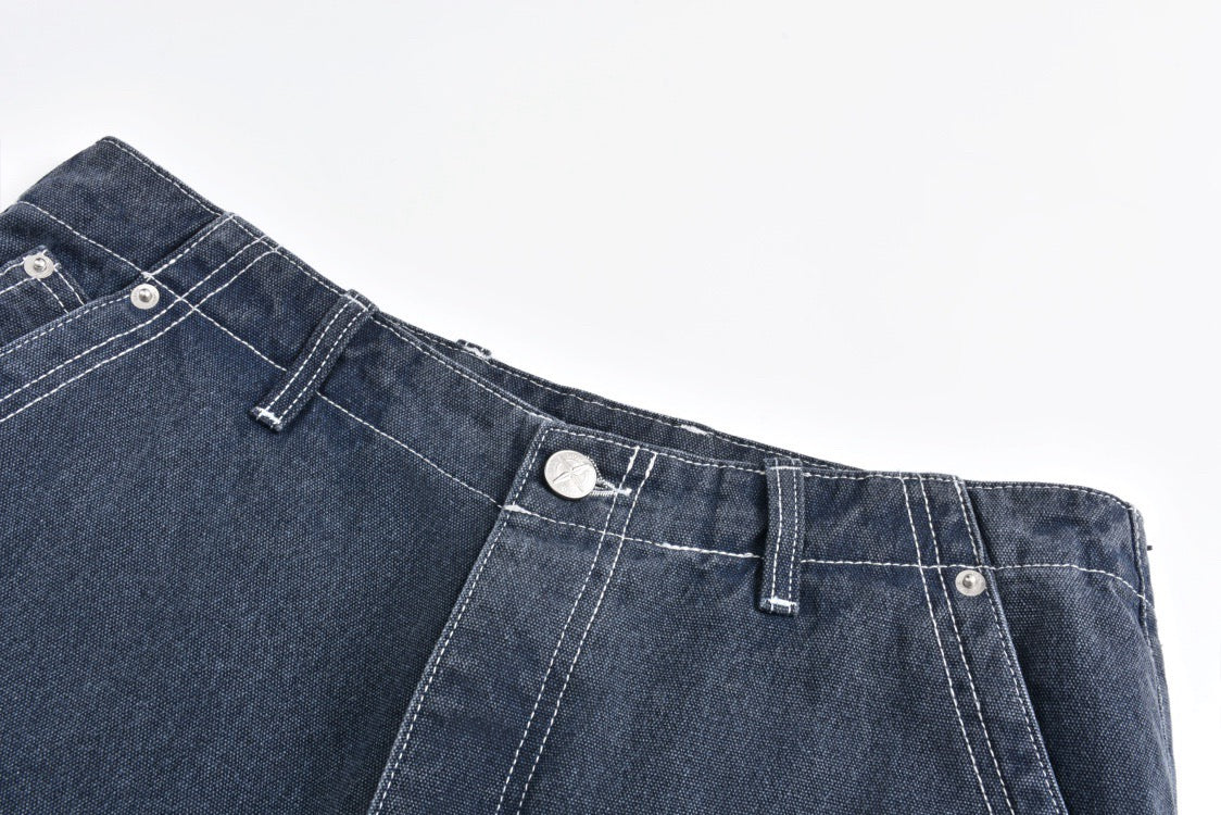 Multi-pocket patched leather jeans